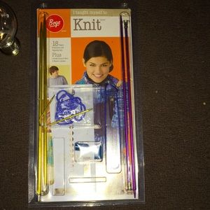 Knitting book with knitting tools
